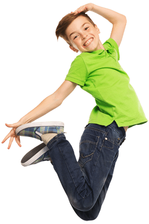 Young boy jumping for joy