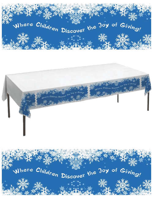 Decorative tablecloth with the phrase - Where Children Discover the Joy of Giving!
